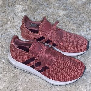 Pink adidas running shoes